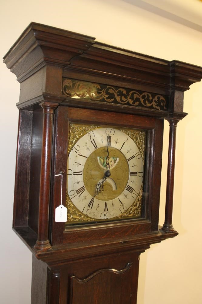 AN OAK LONGCASE CLOCK by William Lister Image