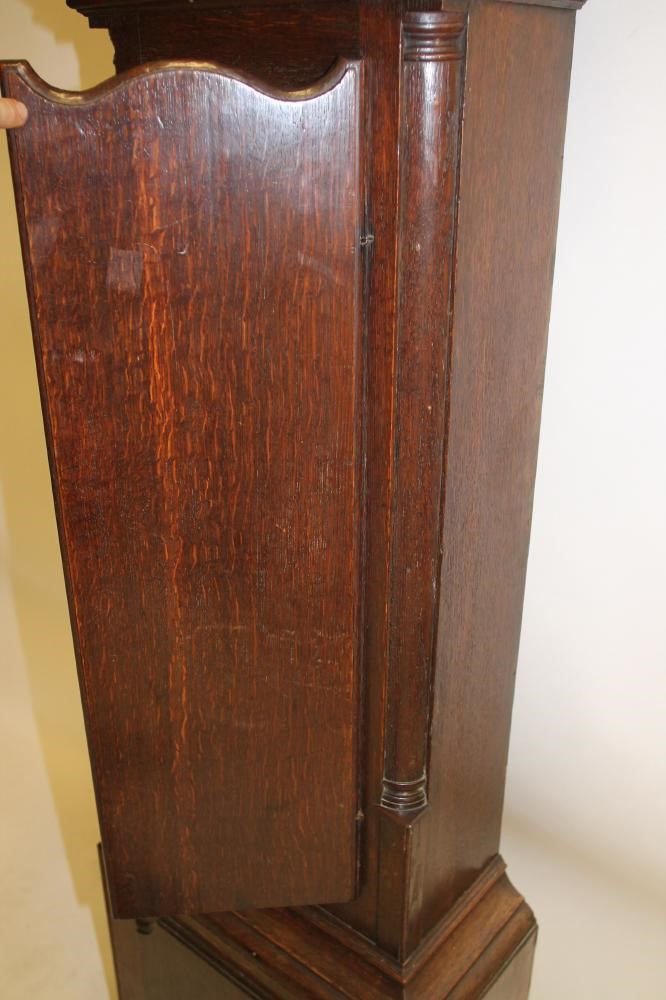 AN OAK LONGCASE CLOCK by William Lister Image