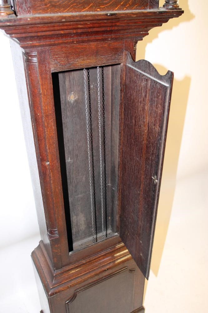 AN OAK LONGCASE CLOCK by William Lister Image