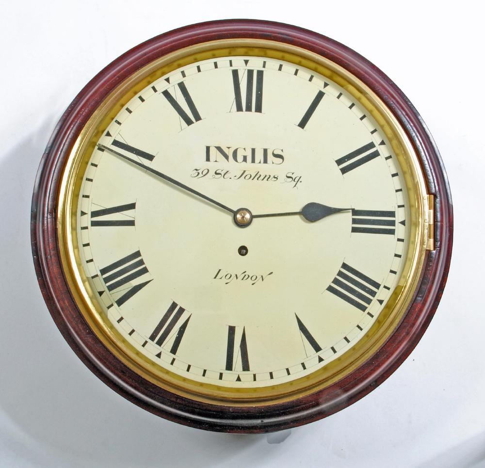 A MAHOGANY WALL CLOCK Image
