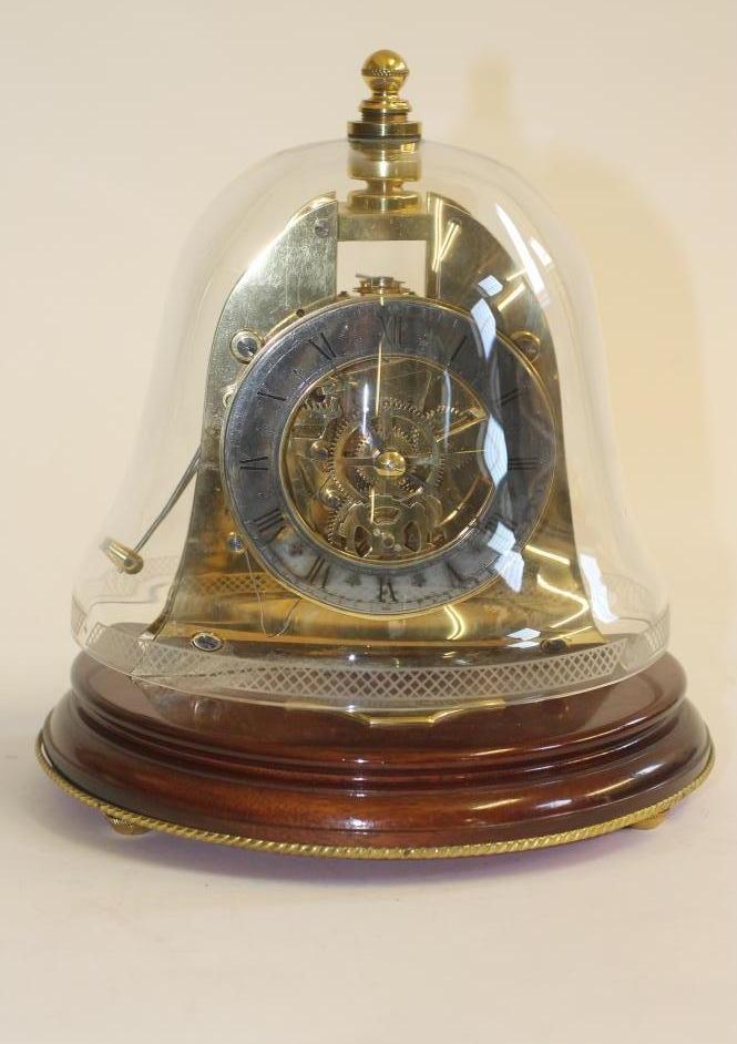 A BRASS "MARINER" CLOCK by Mappin & Webb Image