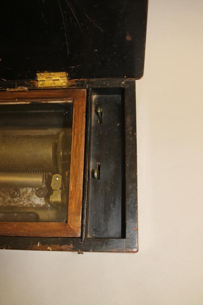 A VICTORIAN WALNUT CASED MUSICAL BOX with 10 1/2" comb and drum movement Image