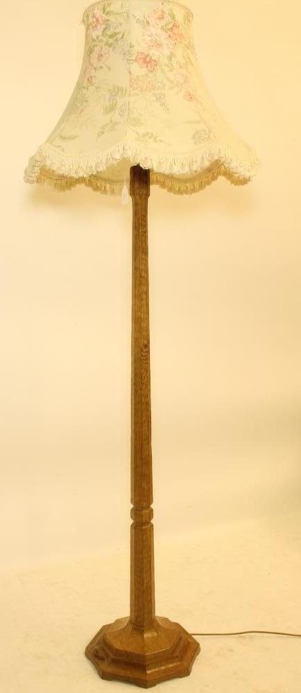 AN ADZED OAK STANDARD LAMP BY ROBERT THOMPSON Image