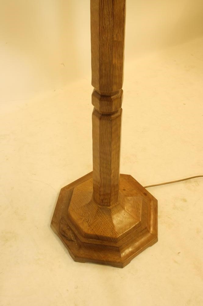 AN ADZED OAK STANDARD LAMP BY ROBERT THOMPSON Image