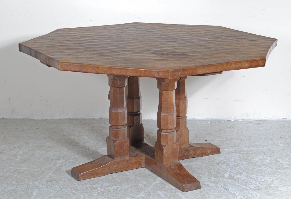 AN ADZED OAK DINING TABLE BY ROBERT THOMPSON Image