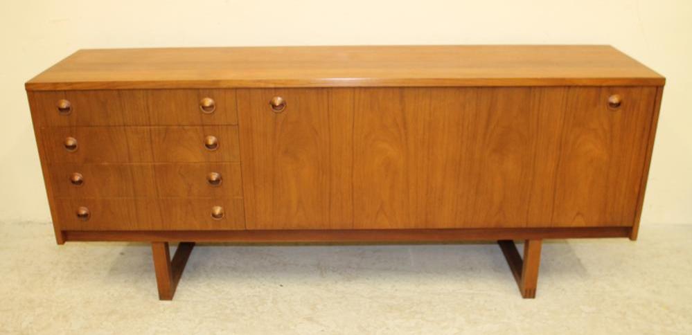 A TEAK SIDEBOARD Image