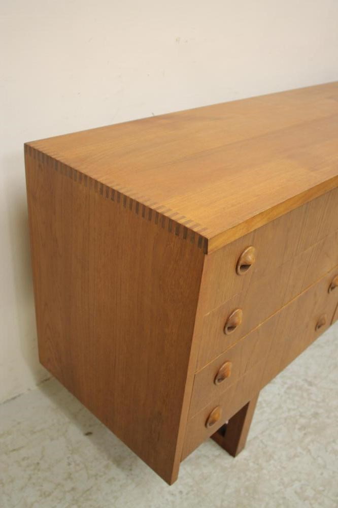 A TEAK SIDEBOARD Image