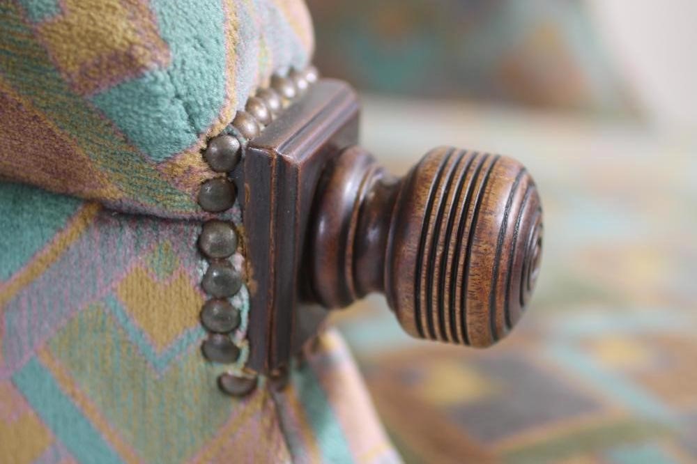 A VICTORIAN WALNUT FRAMED RECLINING CLUB ARMCHAIR upholstered in diamond pattern velvet Image