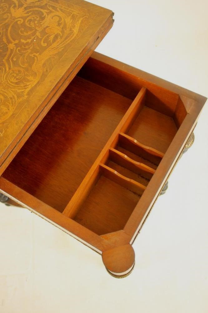 A VICTORIAN KINGWOOD AND MARQUETRY FOLDING CARD TABLE in the French revival style richly inlaid with Image