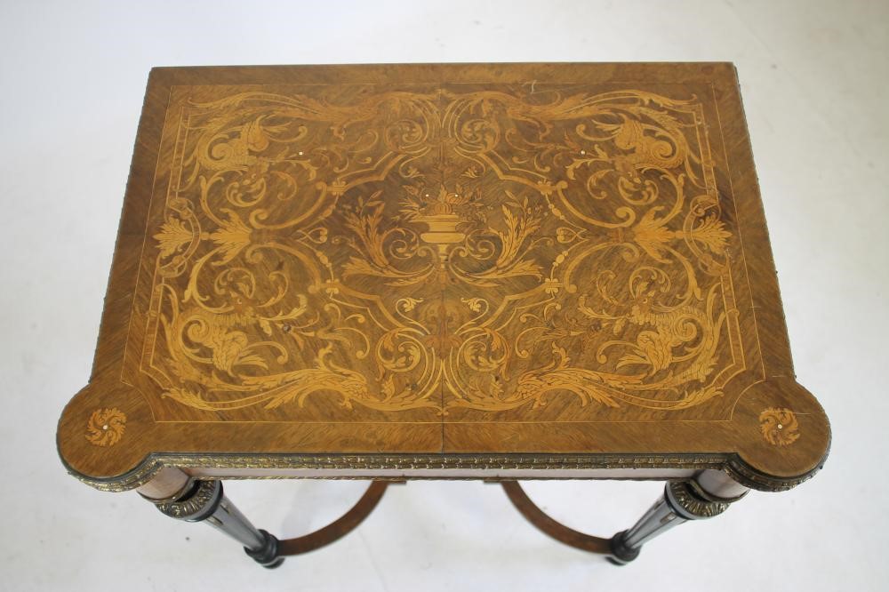 A VICTORIAN KINGWOOD AND MARQUETRY FOLDING CARD TABLE in the French revival style richly inlaid with Image