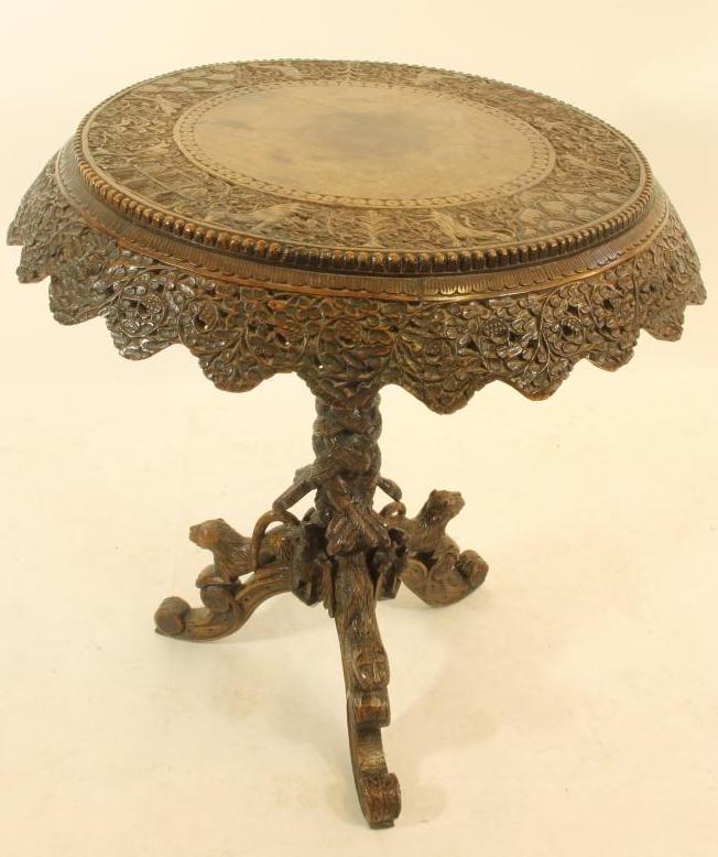 A BURMESE CARVED HARDWOOD TRIPOD TABLE Image