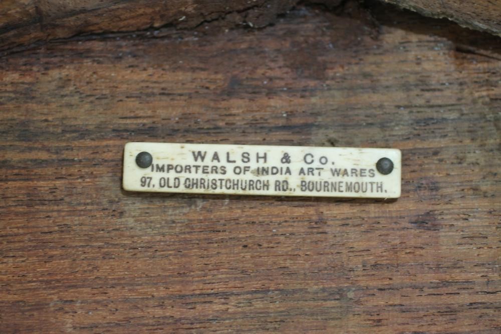 A BURMESE CARVED HARDWOOD TRIPOD TABLE Image