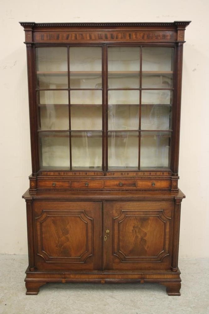 A MAHOGANY BOOKCASE Image