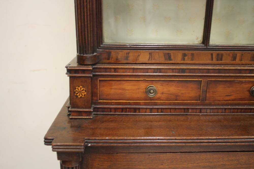 A MAHOGANY BOOKCASE Image