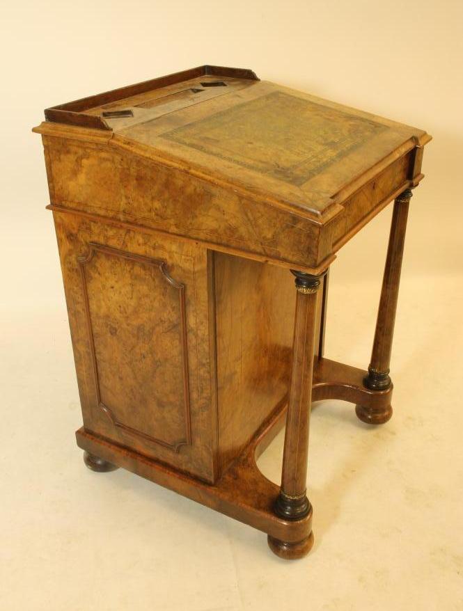 AN EARLY VICTORIAN BURR WALNUT DAVENPORT with stringing Image