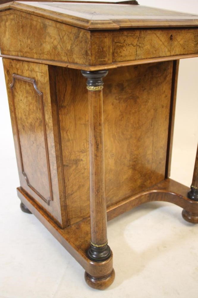 AN EARLY VICTORIAN BURR WALNUT DAVENPORT with stringing Image