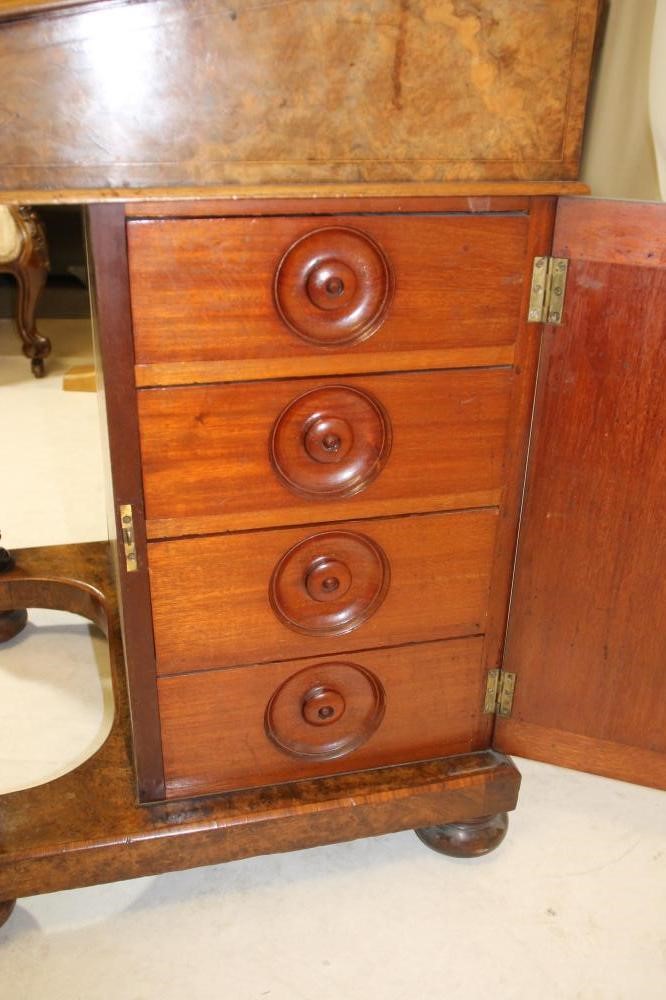 AN EARLY VICTORIAN BURR WALNUT DAVENPORT with stringing Image