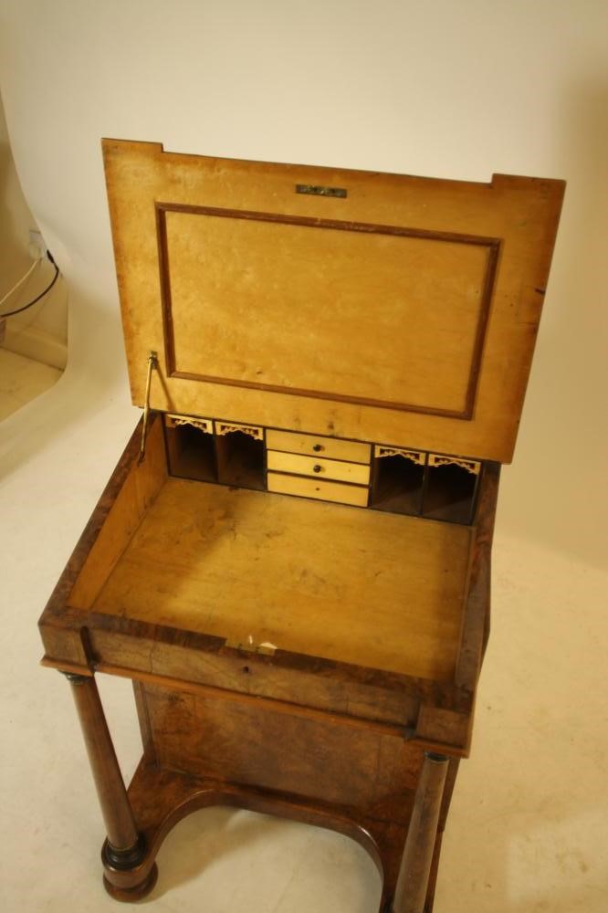 AN EARLY VICTORIAN BURR WALNUT DAVENPORT with stringing Image