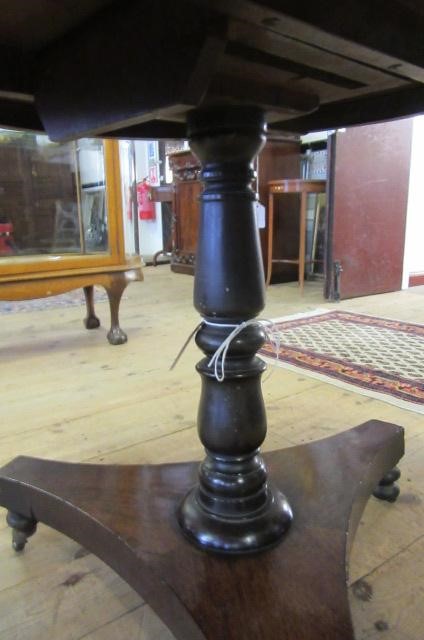 A VICTORIAN ROSEWOOD OCCASIONAL TABLE Image