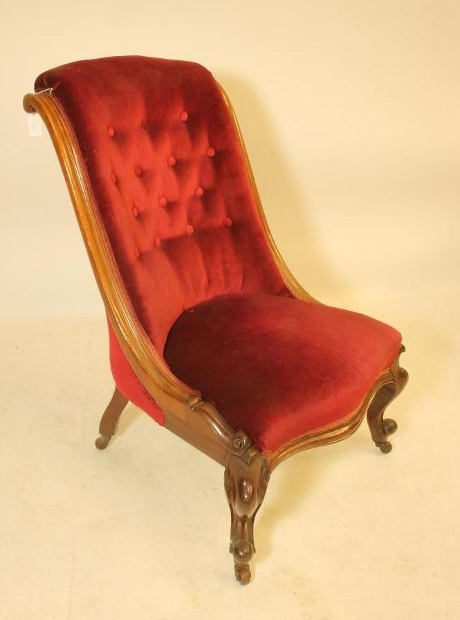 A VICTORIAN WALNUT FRAMED PARLOUR CHAIR of Grecian form Image
