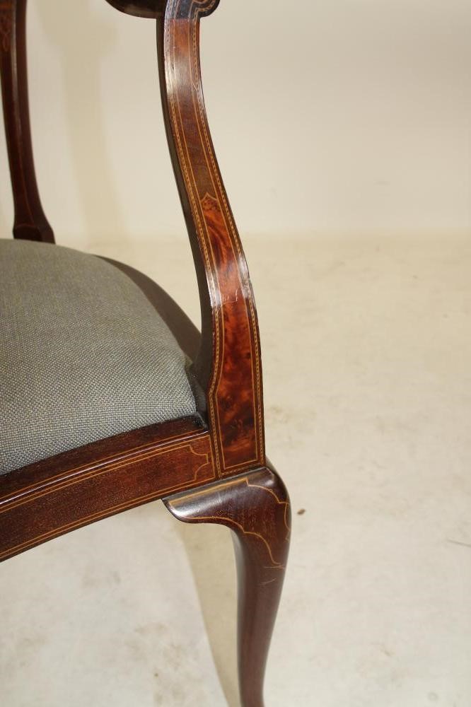 AN EDWARDIAN MAHOGANY ELBOW CHAIR of tub form with inset burr panels and stringing Image