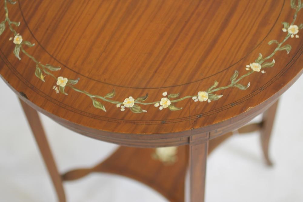 AN EDWARDIAN PAINTED SATINWOOD OCCASIONAL TABLE of circular form crossbanded with stringing Image