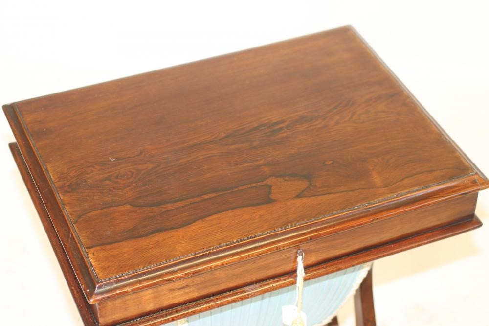A ROSEWOOD WORK TABLE Image