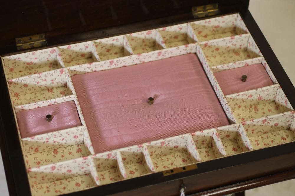 A ROSEWOOD WORK TABLE Image