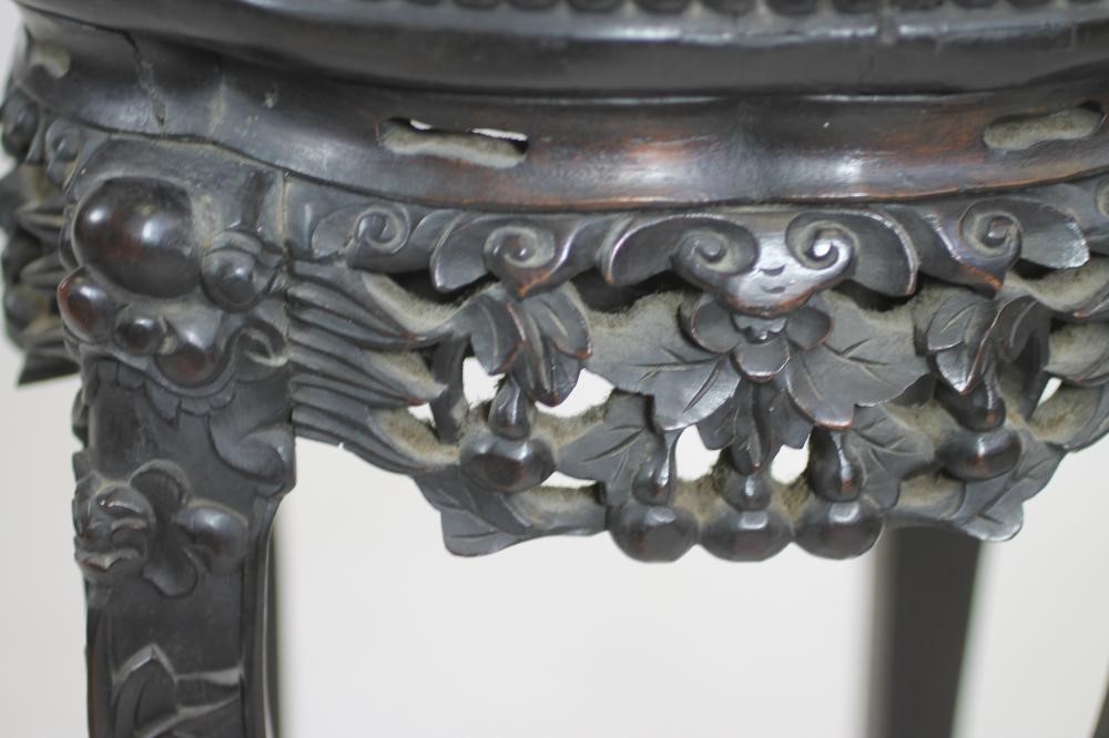 A CHINESE HARDWOOD JARDINIERE STAND Image