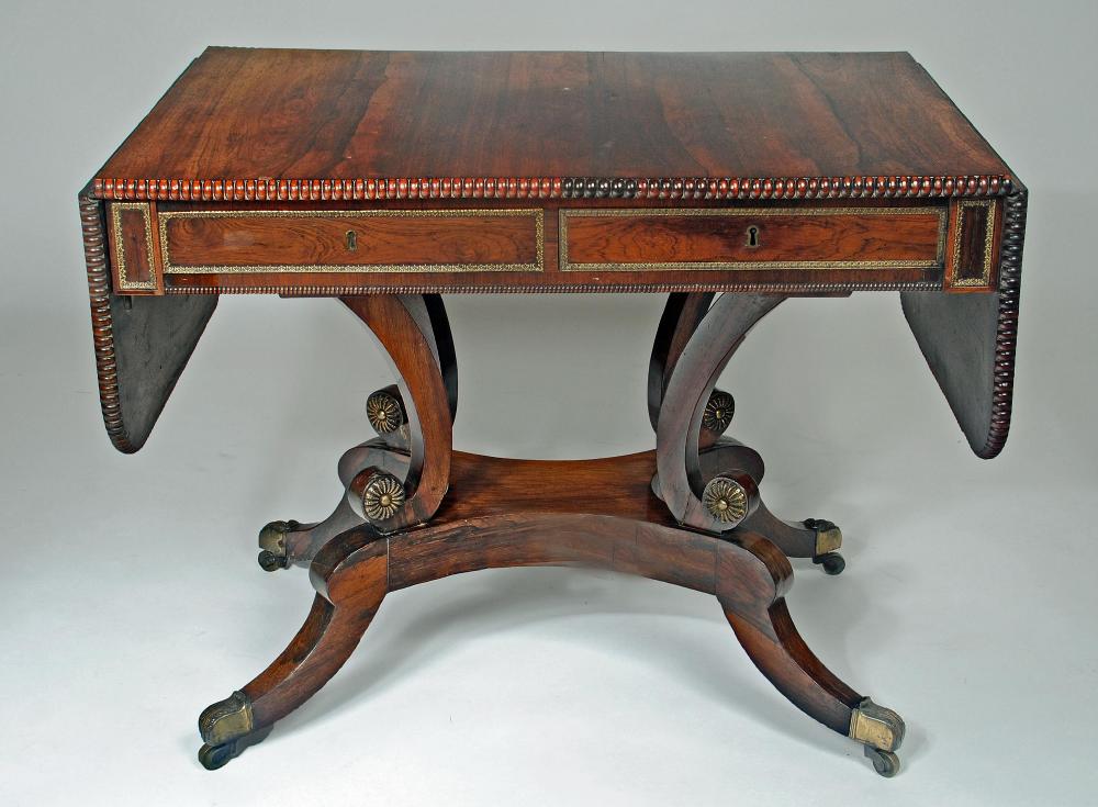 A REGENCY ROSEWOOD SOFA TABLE Image