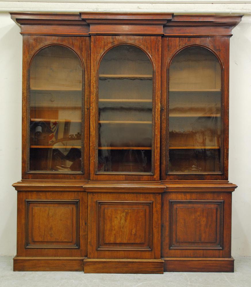 A VICTORIAN MAHOGANY TWO STAGE BREAKFRONT BOOKCASE Image