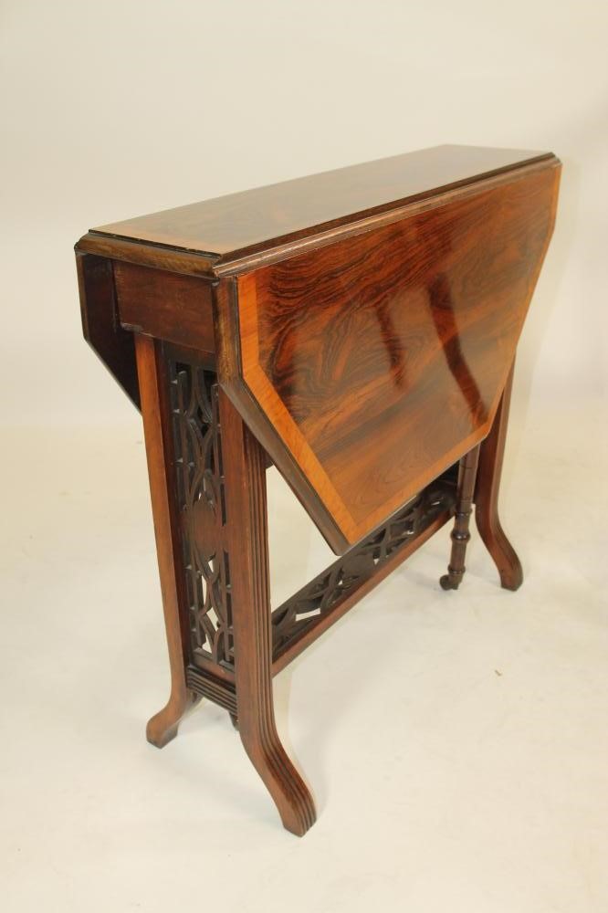 A LATE VICTORIAN ROSEWOOD SUTHERLAND TABLE Image