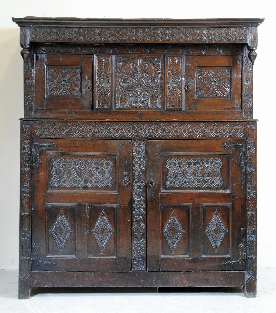 AN OAK PRESS CUPBOARD Image