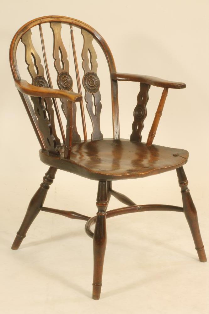 A YEW AND ELM WINDSOR ARMCHAIR Image