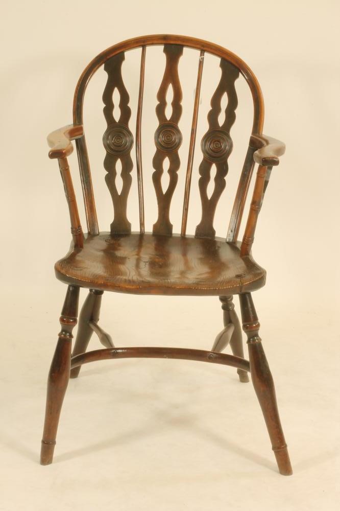 A YEW AND ELM WINDSOR ARMCHAIR Image