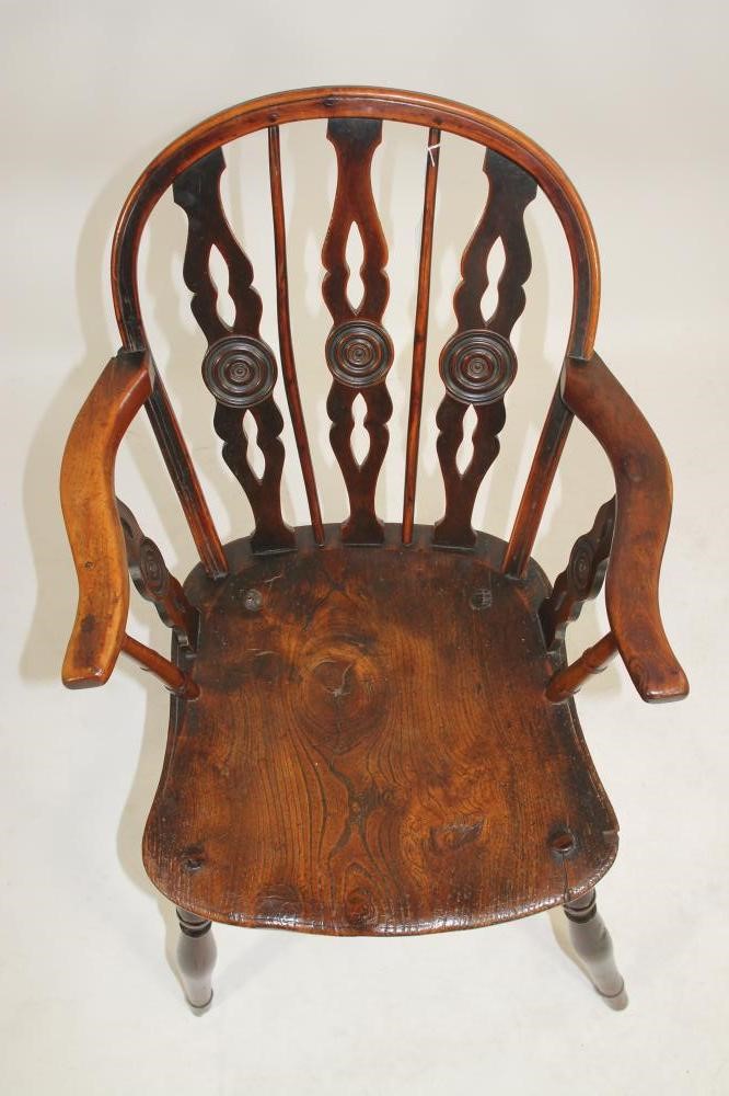 A YEW AND ELM WINDSOR ARMCHAIR Image