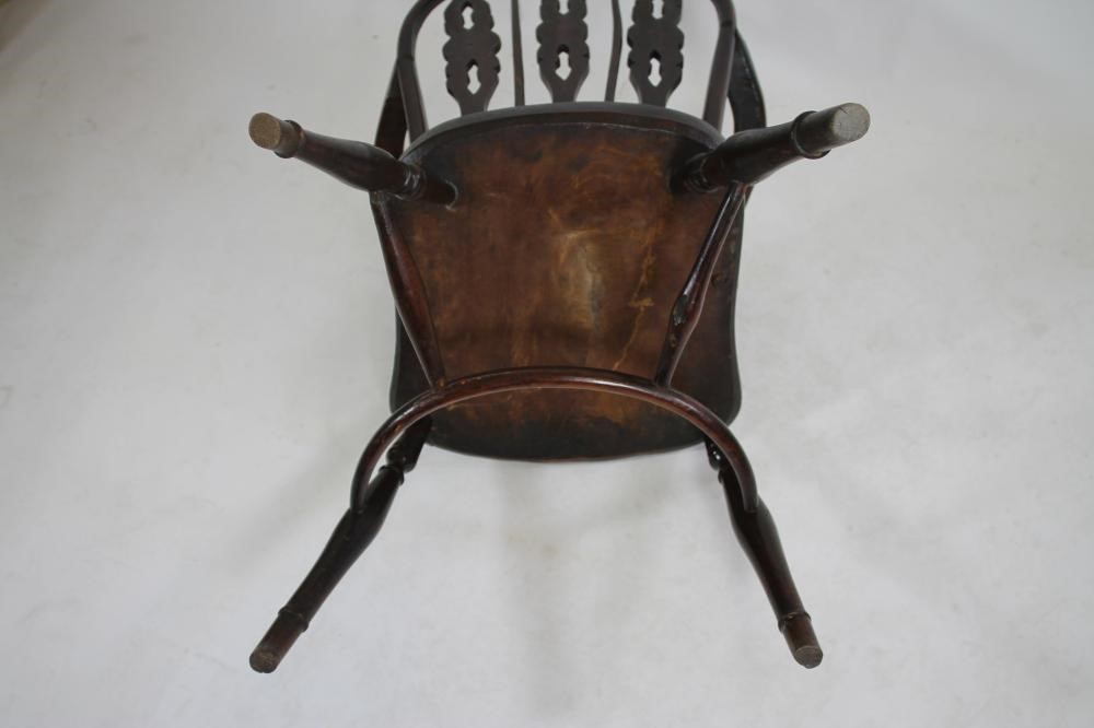 A YEW AND ELM WINDSOR ARMCHAIR Image