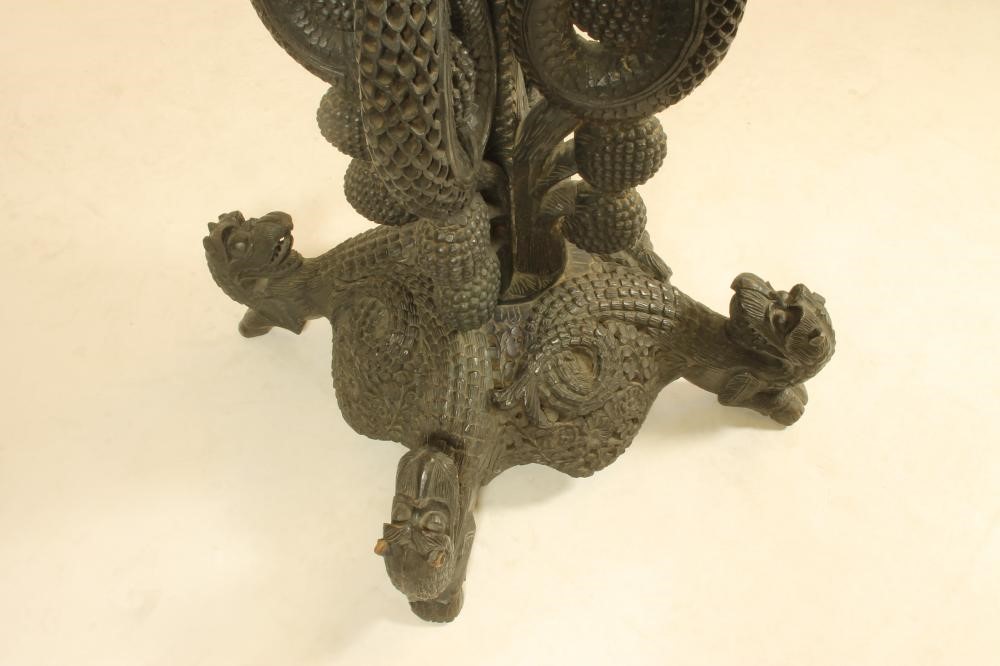 A BURMESE CARVED HARDWOOD JARDINIERE STAND Image