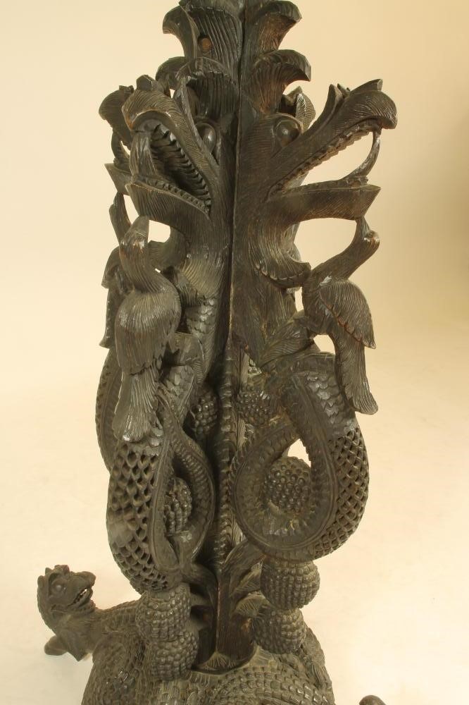 A BURMESE CARVED HARDWOOD JARDINIERE STAND Image
