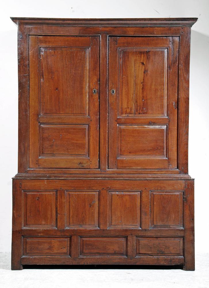 AN OAK LIVERY CUPBOARD Image
