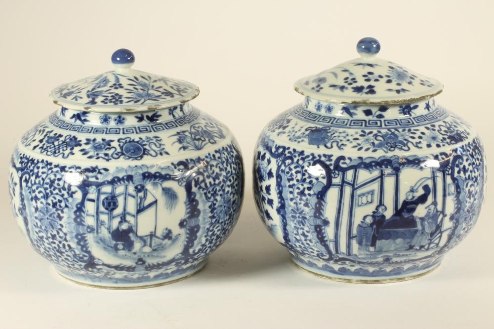 A PAIR OF CHINESE PORCELAIN JARS AND COVERS of squat cylindrical form with sloping shoulders Image