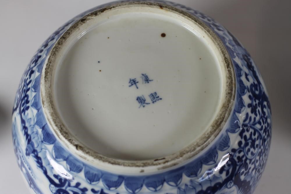 A PAIR OF CHINESE PORCELAIN JARS AND COVERS of squat cylindrical form with sloping shoulders Image