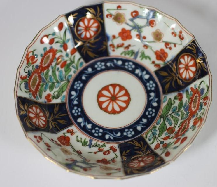 A FIRST PERIOD WORCESTER PORCELAIN COFFEE CUP AND SAUCER Image