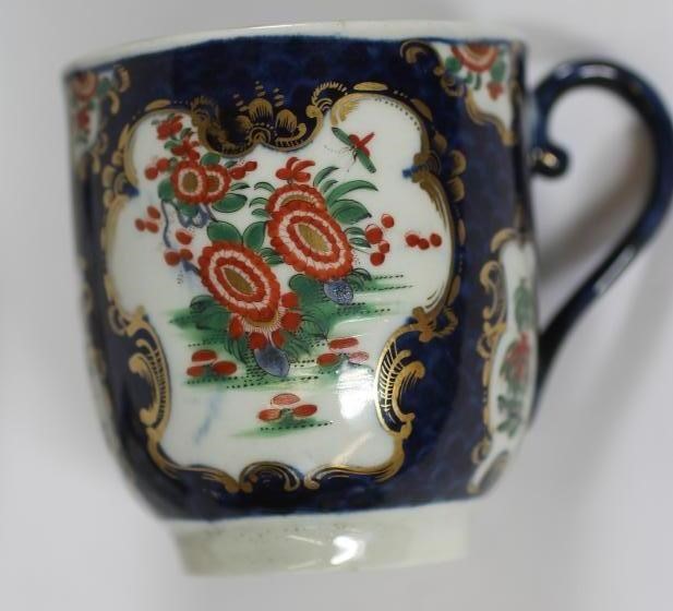 A FIRST PERIOD WORCESTER PORCELAIN COFFEE CUP AND SAUCER Image