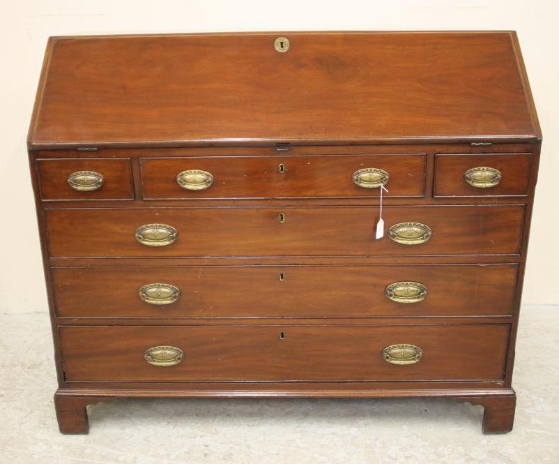 A GEORGIAN MAHOGANY BUREAU by Gillows Image