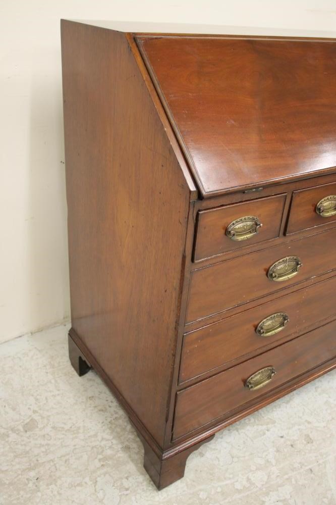 A GEORGIAN MAHOGANY BUREAU by Gillows Image