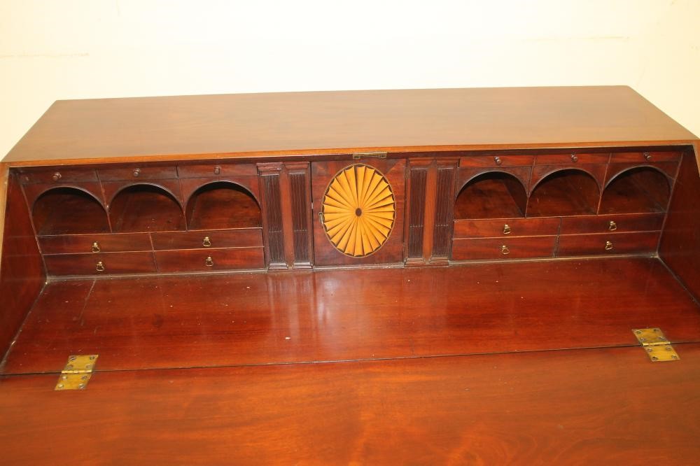 A GEORGIAN MAHOGANY BUREAU by Gillows Image