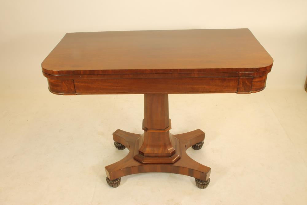 A WILLIAM IV "PLUM PUDDING" MAHOGANY FOLDING TEA TABLE Image