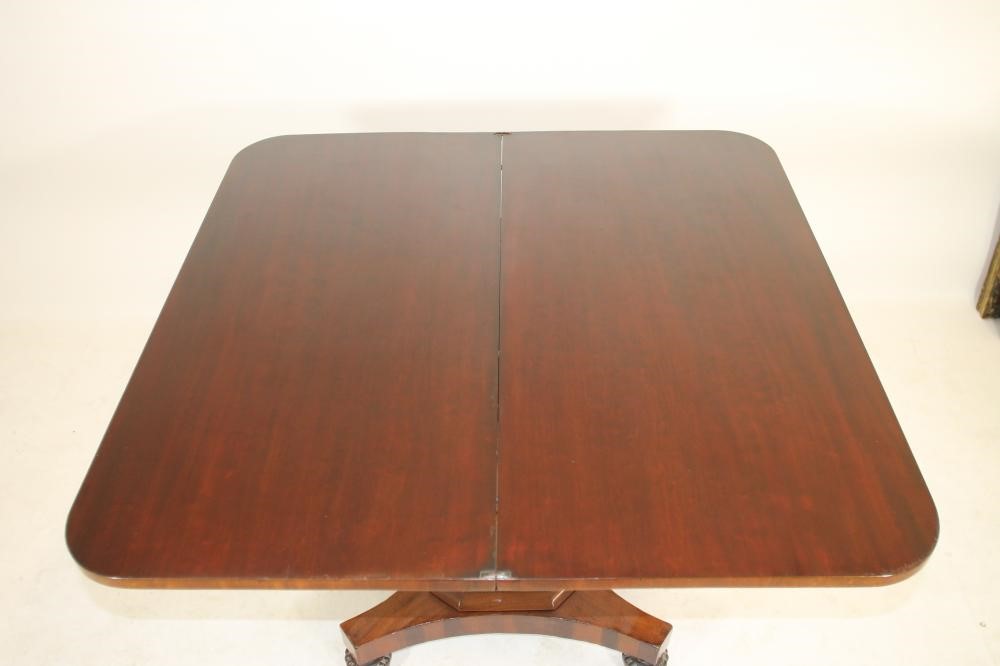 A WILLIAM IV "PLUM PUDDING" MAHOGANY FOLDING TEA TABLE Image