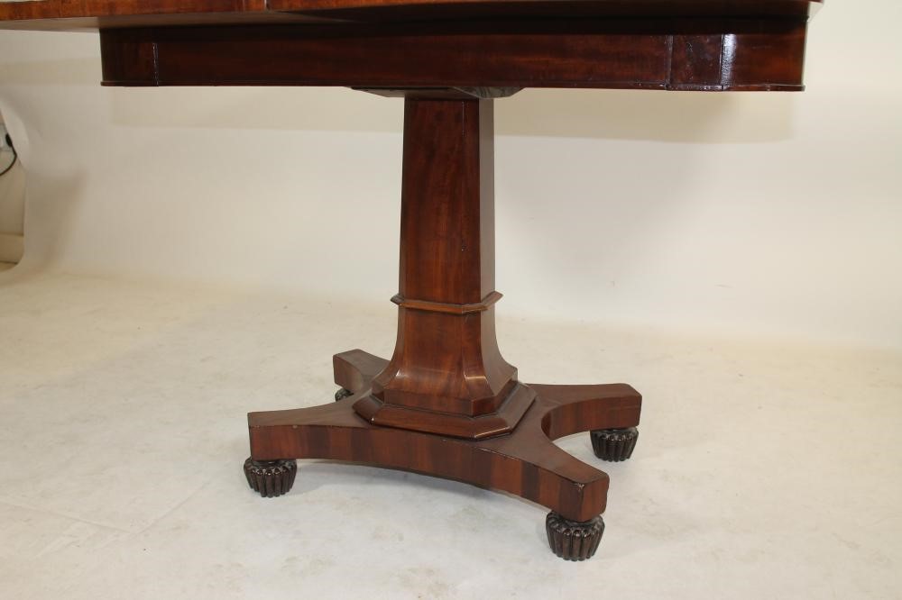 A WILLIAM IV "PLUM PUDDING" MAHOGANY FOLDING TEA TABLE Image